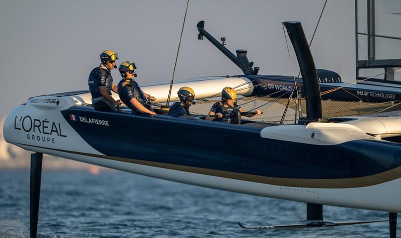 Quentin Delapierre, driver of Les Bleus SailGP Team controls the wheel of the F50 catamaran during a practice session ahead of the Mubadala Abu Dhabi Sail Grand Prix Season Grand Final photo copyright Ricardo Pinto for SailGP taken at  and featuring the F50 class