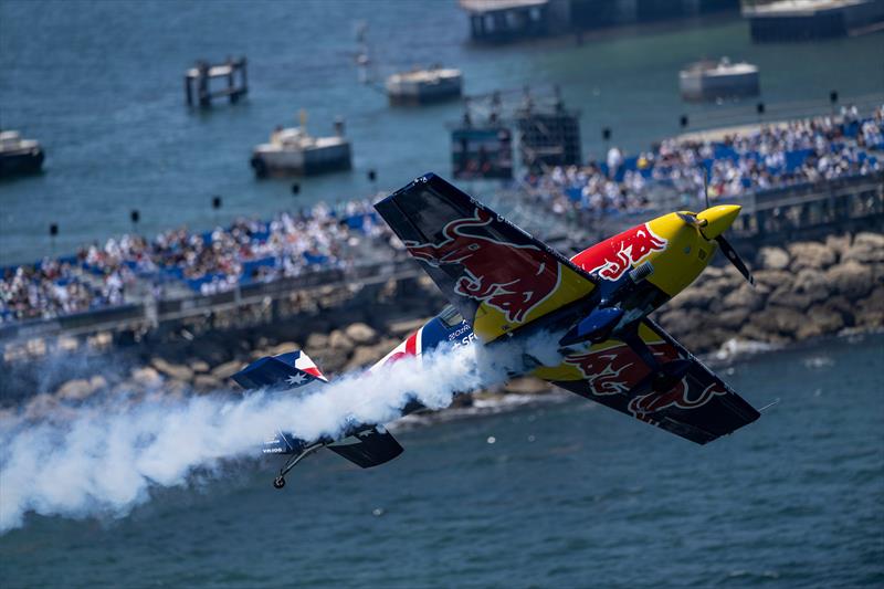 The Red Bull stunt aeroplane flies over the grandstand on Race Day 1 of the Oracle Perth Sail Grand Prix - January 17, 2026  photo copyright James Gourley/SailGP taken at Fremantle Sailing Club and featuring the F50 class