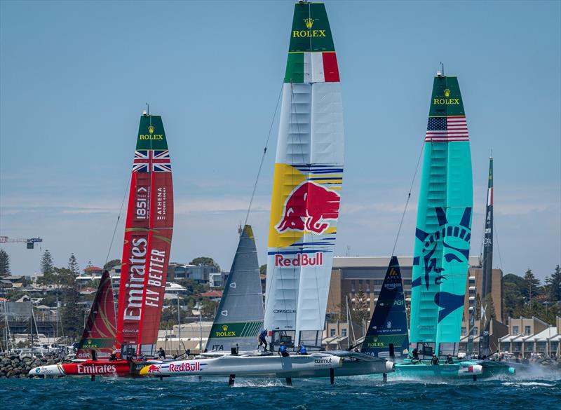 Emirates Great Britain SailGP Team helmed by Dylan Fletcher leads Red Bull Italy SailGP Team helmed by Phil Robertson and United States SailGP Team helmed by Taylor Canfield on Race Day 1 of the Oracle Perth Sail Grand Prix. - photo © SailGP / Red Bull Content Pool