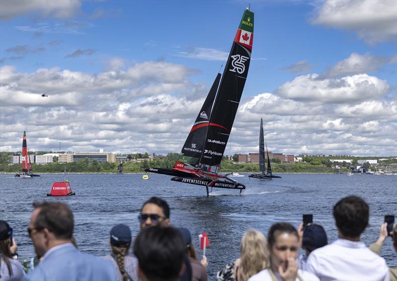 Spectators watch from the Adrenaline Lounge as NORTHSTAR SailGP Team lift out the water as they cross the finish line on Race Day 2 of the Canada Sail Grand Prix in Halifax, Canada photo copyright Jed Jacobsohn for SailGP taken at  and featuring the F50 class
