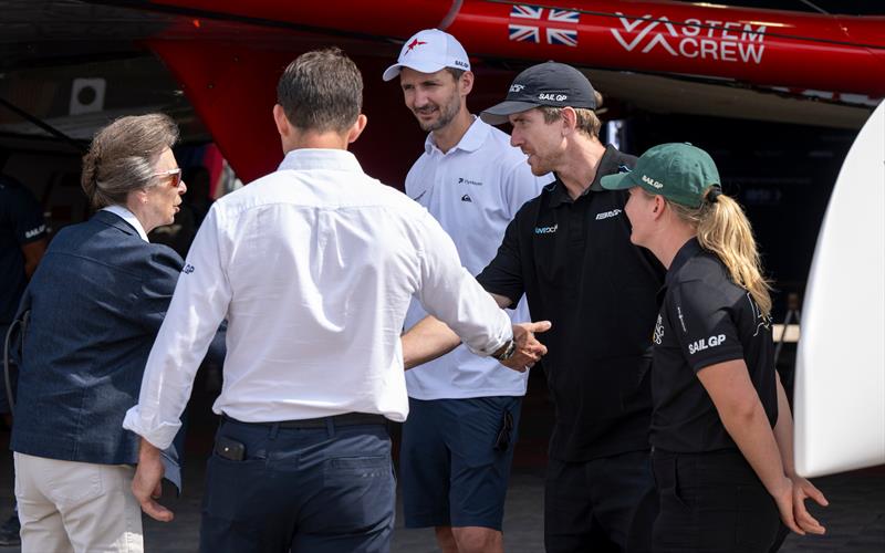 HRH The Princess Royal speaks with Giles Scott, driver of  SailGP Team, Peter Burling, co-CEO and driver of Black Foils SailGP Team, and Tash Bryant, strategist of Bonds Flying Roos, Emirates Great Britain Sail Grand Prix, Portsmouth, July 2026 - photo © Ricardo Pinto/SailGP