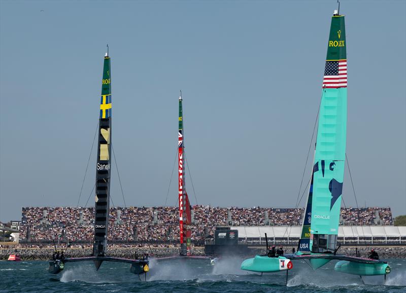 Emirates Great Britain SailGP Team racing towards the grandstand ahead of Artemis SailGP Team and United States SailGP Team on Race Day 1 of the Emirates Great Britain Sail Grand Prix in Portsmouth, United Kingdom - photo © Felix Diemer for SailGP