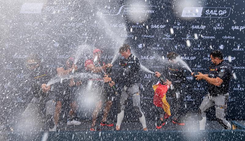 The Los Gallos SailGP Team driven by Diego Botin celebrate on the podium with Barons De Rothschild Champagne during the presentation ceremony after winning the final race on Race Day 2 of the Switzerland Sail Grand Prix in Geneva, Switzerland - photo © Jason Ludlow for SailGP
