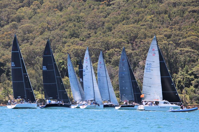 F40 Pittwater OD regatta fleet against the national park - Farr 40 Australian Open Series National Championship photo copyright Jennie Hughes taken at Royal Sydney Yacht Squadron and featuring the Farr 40 class