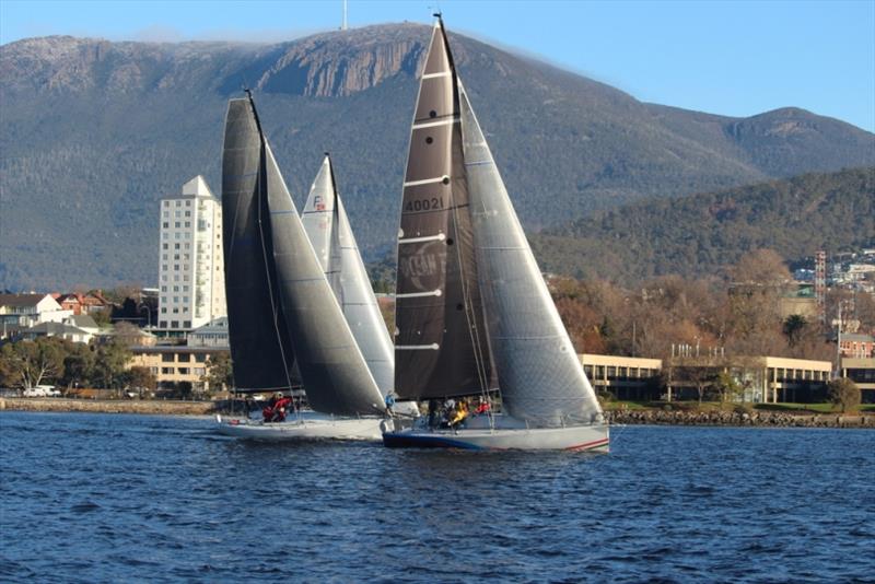 Farr 40s racing on the Derwent today with s light coating of snow on Mount Wellington. - photo © Peter Watson