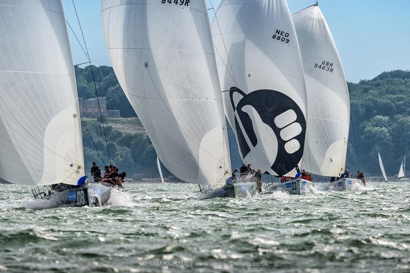 Ran, chased by Rebellion, Hitchhiker, & Pace outside Norris Castle on day 4 of Lendy Cowes Week photo copyright Sam Kurtul / www.worldofthelens.co.uk taken at Cowes Combined Clubs and featuring the Fast 40 class