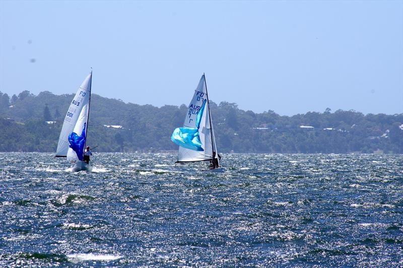 Rafe Heale and Tom Watson on Power AUS7 led Matt Draper and Thomas Stuchbery on Freight Train AUS001 from the wing to the leeward mark. Both boats are pictured dropping their spinnakers sailing to the leeward mark at the end of the first lap - photo © Jeanette Severs