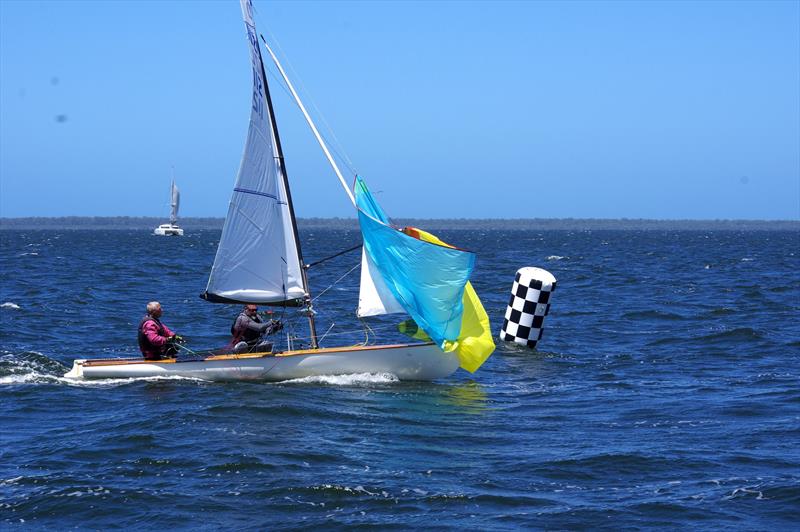 David Gibb helms Lupicus NZL112 while John Bailey neatly drops the spinnaker as they cross the finish line in third place in race five of the Flying Dutchman 2026 Australian championship regatta - photo © Jeanette Severs