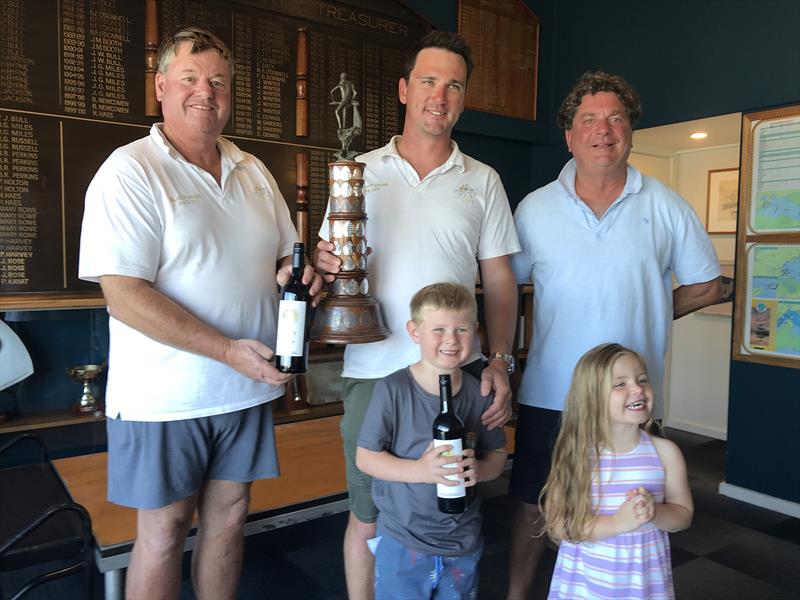 Darren Hocking, president of the Australian FD Association, presents the championship trophy to Matt Draper, skipper of Freight Train AUS001 and the new 2026 Australian FD champion. Metung Yacht Club Commodore, Peter Kanat, is on the right - photo © Jeanette Severs