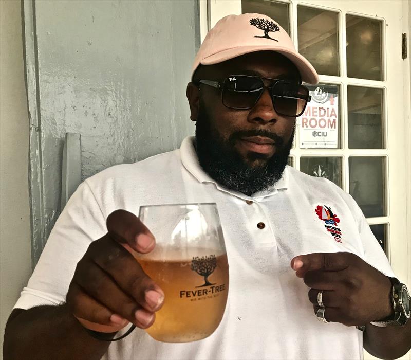 English Harbour Radio's Kenny D enjoys a 5 Year old English Harbour Rum and Fever-Tree Ginger Beer photo copyright Louay Habib / Antigua Sailing Week taken at Antigua Yacht Club and featuring the  class