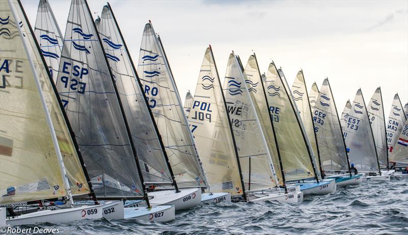 The fleet start on day 3 of the Finn Europeans in Barcelona photo copyright Robert Deaves taken at  and featuring the Finn class