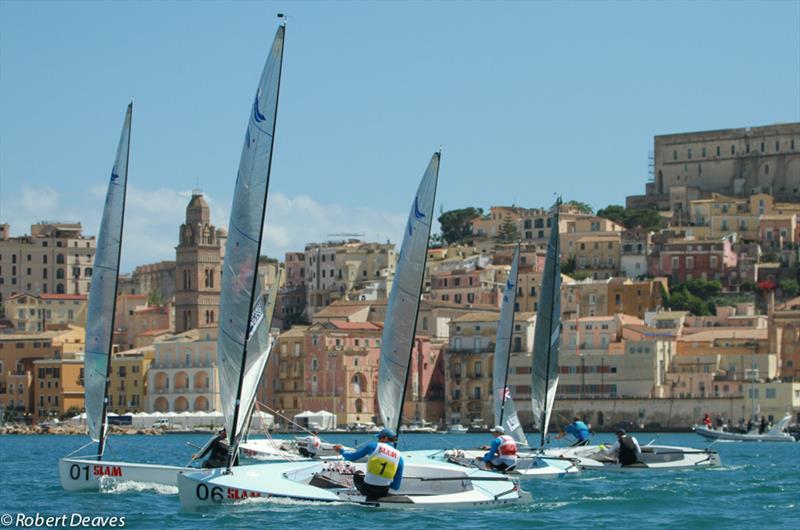 Medal racing during the Finn Gold Cup in Gaeta photo copyright Robert Deaves taken at Yacht Club Gaeta and featuring the Finn class