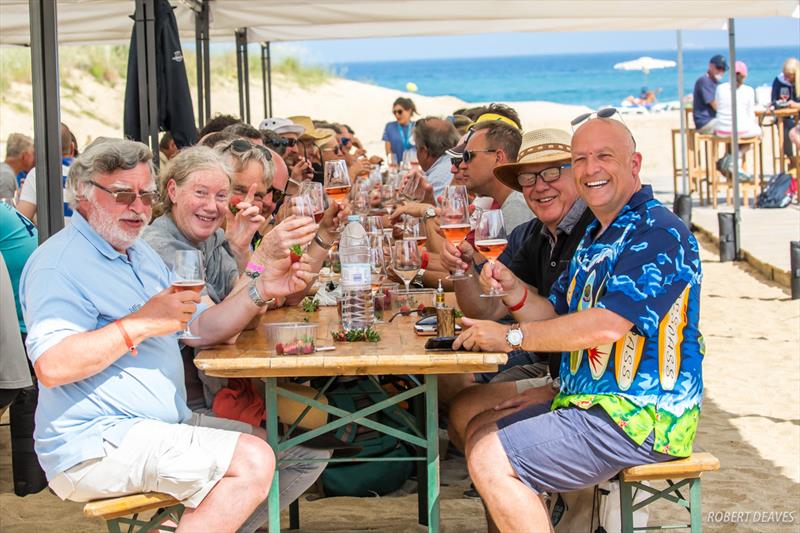 Plenty to be cheerful about despite the lack of wind and choice of shirt at the Finn World Masters photo copyright Robert Deaves taken at Club Nautico El Balis and featuring the Finn class