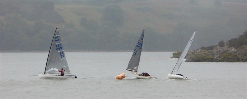 Finn Open, gybe mark in the gloom during Solway YC Kippford Week photo copyright Becky Davison taken at Solway Yacht Club and featuring the Finn class
