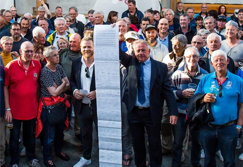 300 Finn sailors and supporters stand behind the letter to World Sailing photo copyright Robert Deaves taken at  and featuring the Finn class