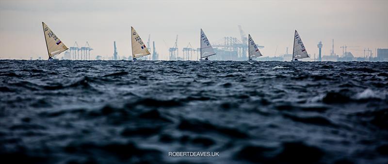 Race 4 on day 2 of the Finn Europeans in Gdynia, Poland photo copyright Robert Deaves taken at  and featuring the Finn class