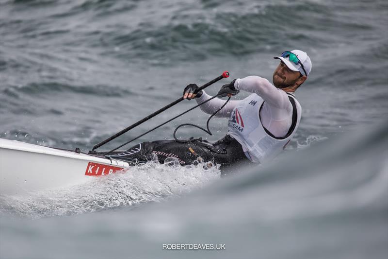 2021 Finn Gold Cup day 4: Luke Muller, USA photo copyright Robert Deaves taken at Vilamoura Sailing and featuring the Finn class