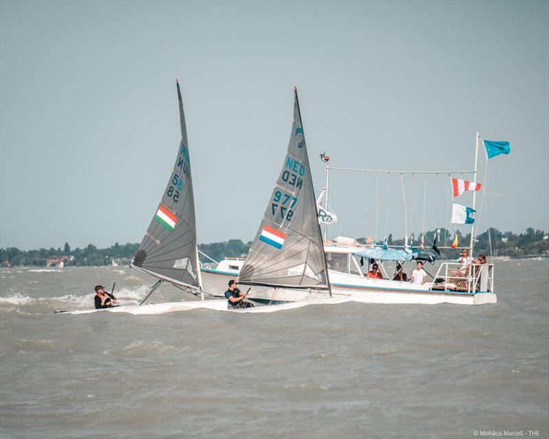 Dénes Ujváry, HUN and Sjoerd Hofland, NED on day 1 of the U23 Finn Worlds at Lake Balaton, Hungary photo copyright Marcell Mohácsi taken at Tihanyi Hajós Egylet and featuring the Finn class