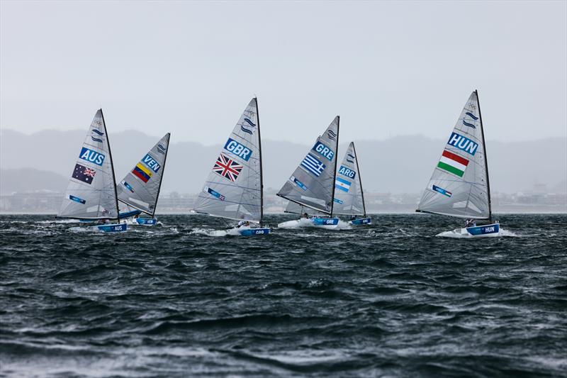 Finn fleet downwind on Tokyo 2020 Olympic Sailing Competition Day 3 - photo © Sailing Energy / World Sailing