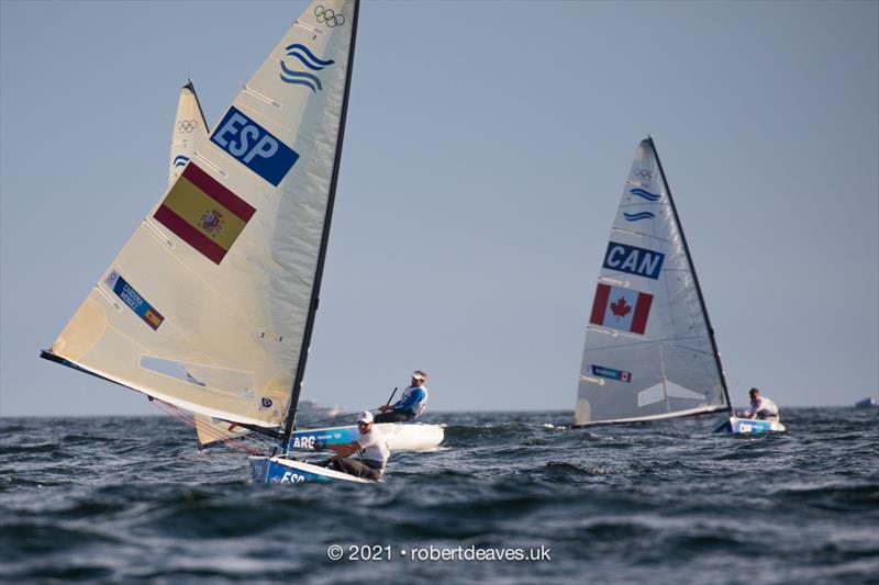 Joan Cardona, ESP, leads Race 2 on the first day of Finn class racing at the Tokyo 2020 Olympic Sailing Competition photo copyright Robert Deaves / www.robertdeaves.uk taken at  and featuring the Finn class