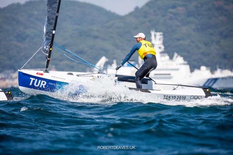 Alican Kaynar (TUR)  on the second day of Finn class racing at the Tokyo 2020 Olympic Sailing Competition photo copyright Robert Deaves / www.robertdeaves.uk taken at  and featuring the Finn class