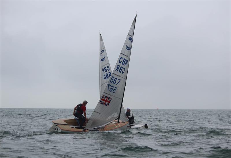 Finn Travellers at Highcliffe photo copyright Sarah Desjonqueres taken at Highcliffe Sailing Club and featuring the Finn class