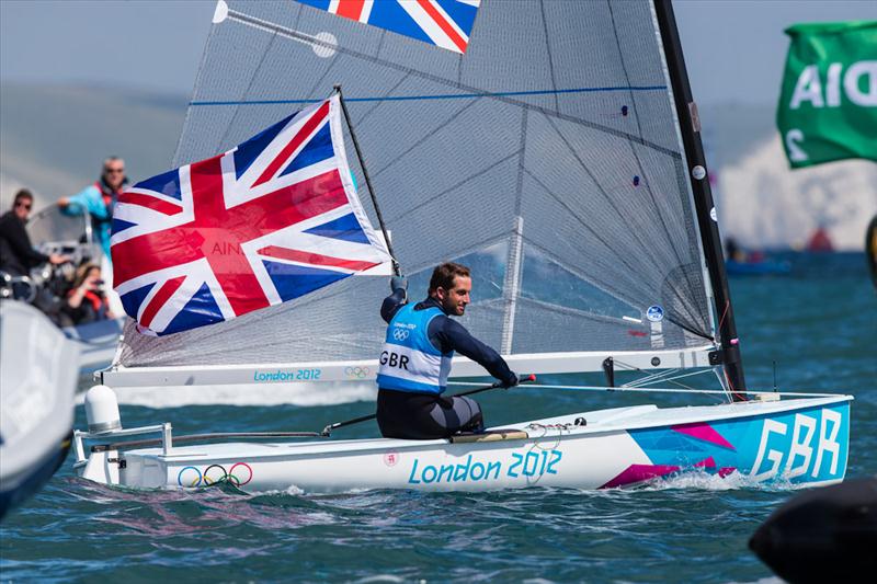 Ben Ainslie wins a historic fourth gold medal at the London 2012 Olympic Sailing Competition photo copyright Tom Gruitt / www.tom-gruitt.co.uk taken at Weymouth & Portland Sailing Academy and featuring the Finn class