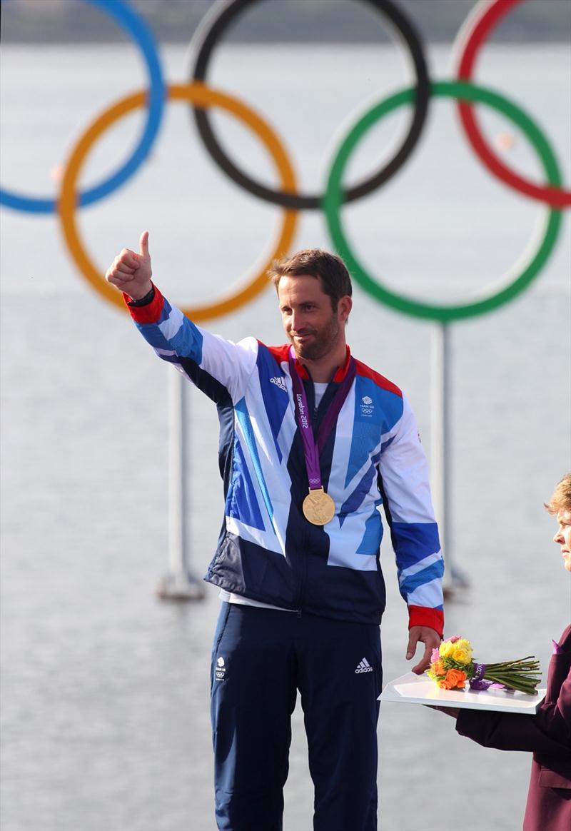 Ben Ainslie wins a historic fourth gold medal at the London 2012 Olympic Sailing Competition photo copyright Richard Langdon / Ocean Images taken at Weymouth & Portland Sailing Academy and featuring the Finn class