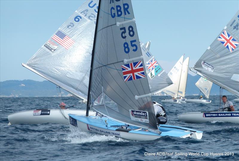 Andrew Mills and Giles Scott in action at the ISAF Sailing World Cup Hyeres day 4 photo copyright Claire ADB / ISAF Sailing World Cup Hyeres taken at  and featuring the Finn class