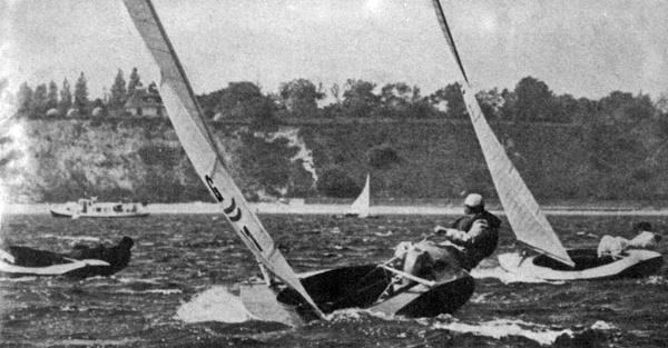 The Finn has been an Olympic class for 66 years - Paul Elvstrom (right) holding his boat flat in the strong breeze photo copyright YachtsandYachting taken at  and featuring the Finn class