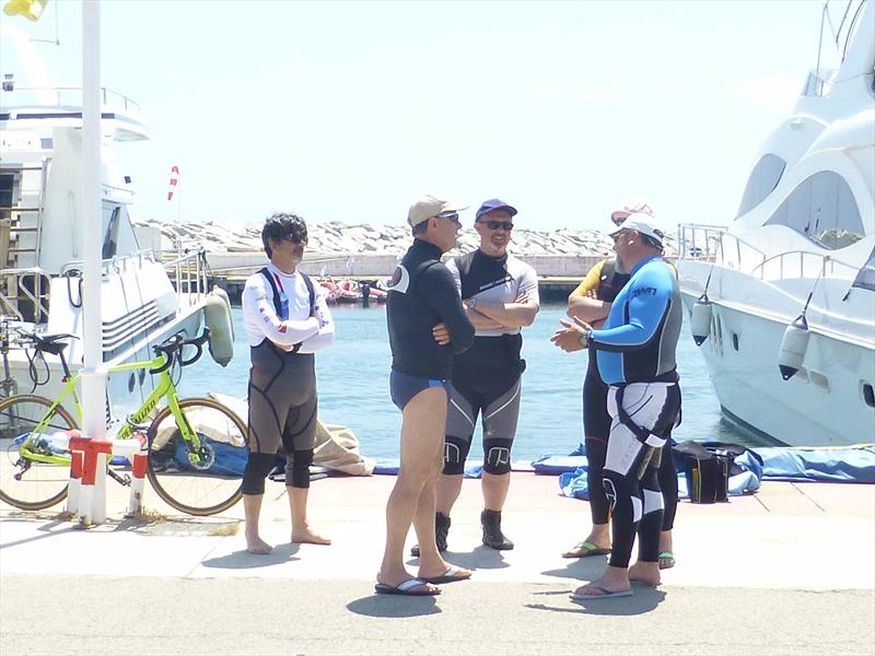 More talk while waiting for wind - 2018 Finn Masters Worlds, El Balis, May 2018 - photo © Gus Miller