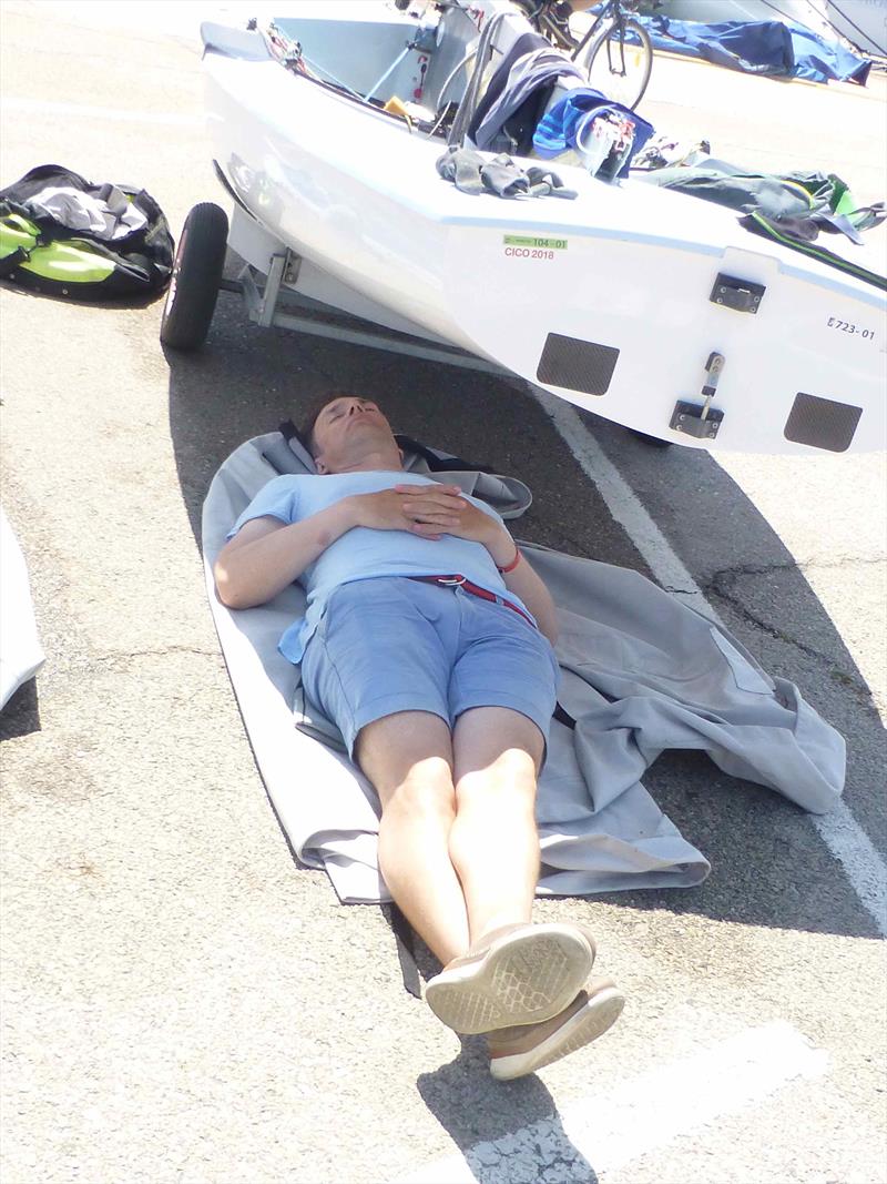 Siesta while waiting for wind - 2018 Finn Masters Worlds, El Balis, May 2018 photo copyright Gus Miller taken at Club Nautico El Balis and featuring the Finn class