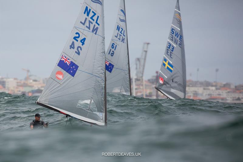 Finn Gold Cup - Big waves and tight racing photo copyright Robert Deaves taken at Vilamoura Sailing and featuring the Finn class