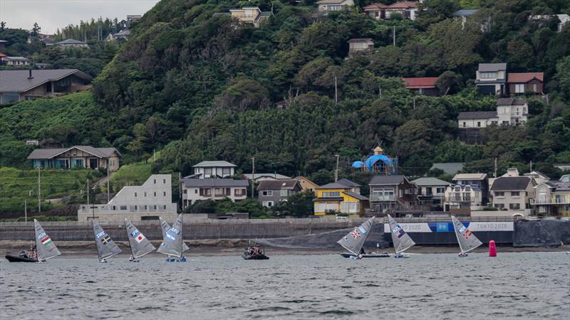 Tokyo2020 - Day 3 - July, 27, - Enoshima, Japan. Finns round their windwward mark placed close to shore, and with the breeze obstructed by the hill behind. Is this Olympic standard course placement? - photo © Richard Gladwell - Sail-World.com / nz