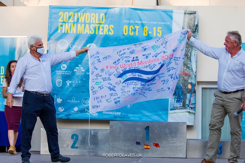 FVRM President Arturo Antonio Garcia Pallares receives the Finn flag signed by all competitors by the Masters President Andy Denison - 2021 Finn World Masters - photo © Robert Deaves