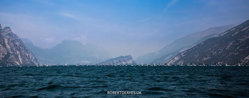 The fleet on day 4 of the Finn Gold Cup at Malcesine photo copyright Robert Deaves / www.robertdeaves.uk taken at Fraglia Vela Malcesine and featuring the Finn class