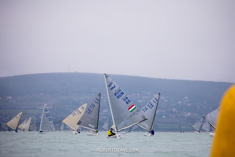 Race 9 at the 2023 Open and U23 Finn Europeans in Csopak, Hungary photo copyright Robert Deaves / www.robertdeaves.uk taken at Procelero Sportegyesület and featuring the Finn class