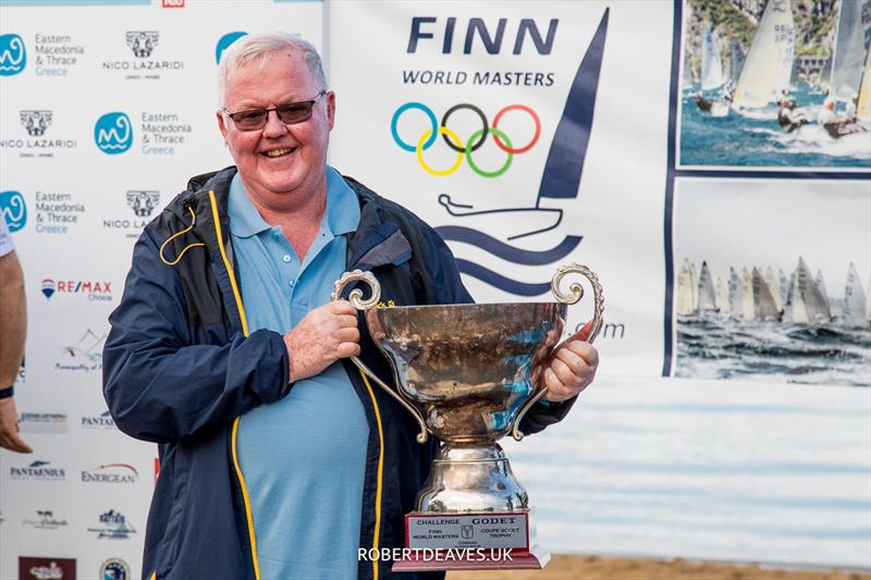 Chris Watts with the Godet Trophy on day 1 of the 2023 Finn World Masters in Greece photo copyright Robert Deaves / www.robertdeaves.uk taken at  and featuring the Finn class