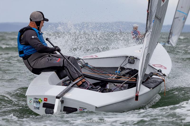 Tony Arnold, AUS - 2026 Finn World Masters day 2 photo copyright Robert Deaves / www.robertdeaves.uk taken at Royal Queensland Yacht Squadron and featuring the Finn class