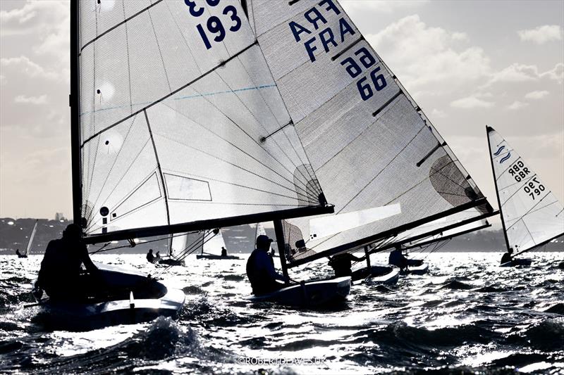 Racing on day 3 of the 2026 Finn World Masters photo copyright Robert Deaves / www.robertdeaves.uk taken at Royal Queensland Yacht Squadron and featuring the Finn class