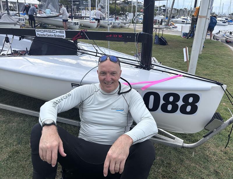 Andrew Coutts at the 2026 Finn World Masters photo copyright Robert Deaves taken at Royal Queensland Yacht Squadron and featuring the Finn class