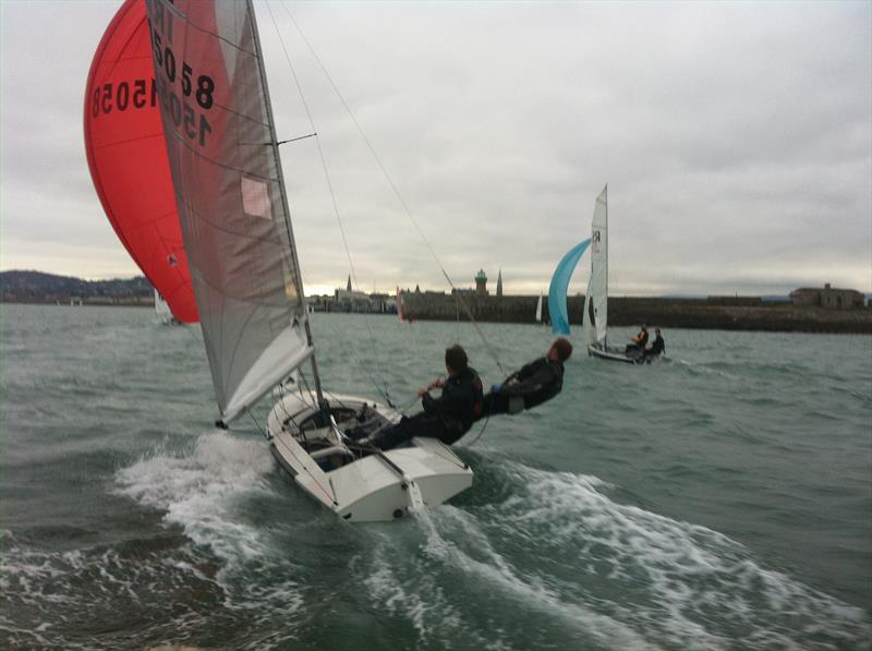 Kenneth Rumball & Brian Byrne returning to harbour after winning the fifth round of the DMYC 2014/15 Frostbite Series for Fireballs photo copyright Glyn, Irish National Sailing School taken at Dun Laoghaire Motor Yacht Club and featuring the Fireball class