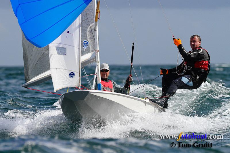 Action from the Fireball National Championships photo copyright Tom Gruitt / www.fotoboat.com taken at Pentewan Sands Sailing Club and featuring the Fireball class