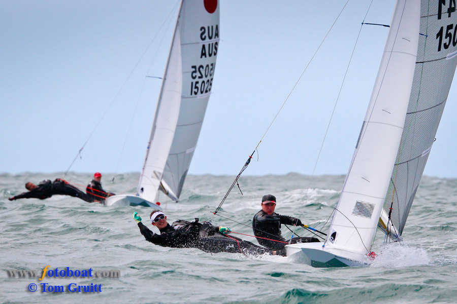 Final day action from the Fireball worlds in Mandurah, Australia photo copyright Tom Gruitt / www.fotoboat.com taken at Mandurah Offshore Fishing and Sailing Club and featuring the Fireball class