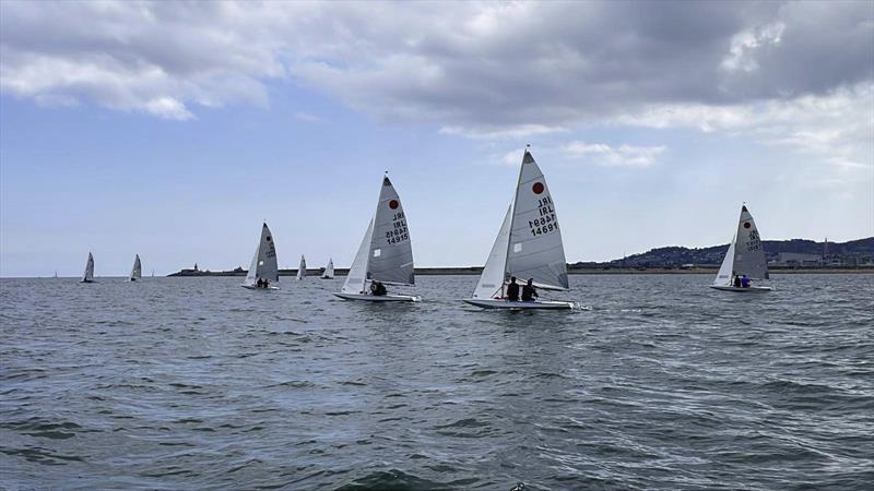 Racing in Seapoint Bay on Sunday in light airs during the Fireball Open at Dun Laoghaire photo copyright Thomas Chaix taken at Dun Laoghaire Motor Yacht Club and featuring the Fireball class