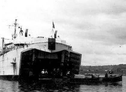 The Tank Landing Craft, moored in the entrance to the river Medina at Cowes, being loaded up with Fireflys destined for Torquay. It was now that the lack of launching trollies became apparent! photo copyright Archive taken at  and featuring the Firefly class