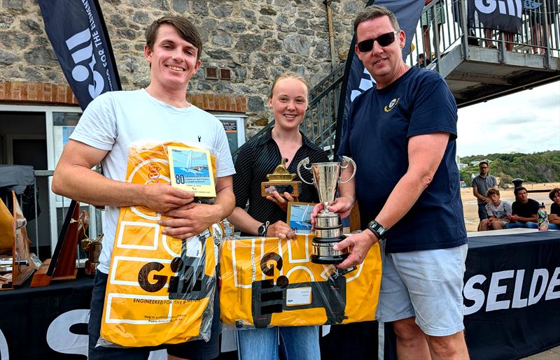 Rhona Enkel and Ben Whaley, 80th Anniversary Firefly National Champions, with TSC Commodore Marc Shepherd photo copyright Mark Jardine taken at Tenby Sailing Club and featuring the Firefly class