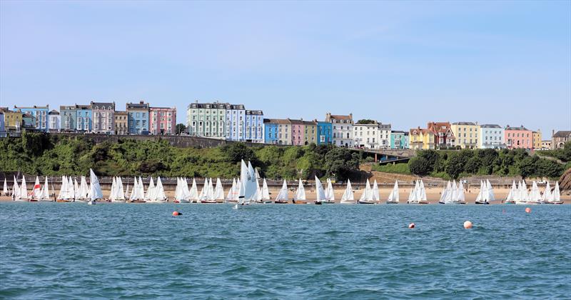 The massive fleet launches from the beach on Day 1 of the 80th Anniversary Firefly Nationals at Tenby - photo © Mark Jardine