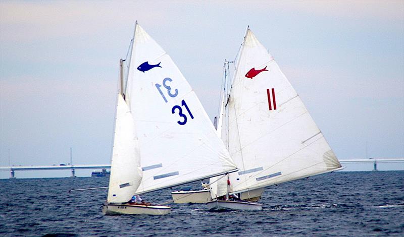 Navy Yacht Club Pensacola skipper Tom Whitehurst passed Pensacola Beach YC skipper Kirk Newkirk to take first place in Race 2 of the 2021 GYA Fish Class Championship. Navy went on to win the Championship in a 10-point tiebreaker with Pensacola YC photo copyright Talbot Wilson taken at Pensacola Yacht Club and featuring the Fish Class class