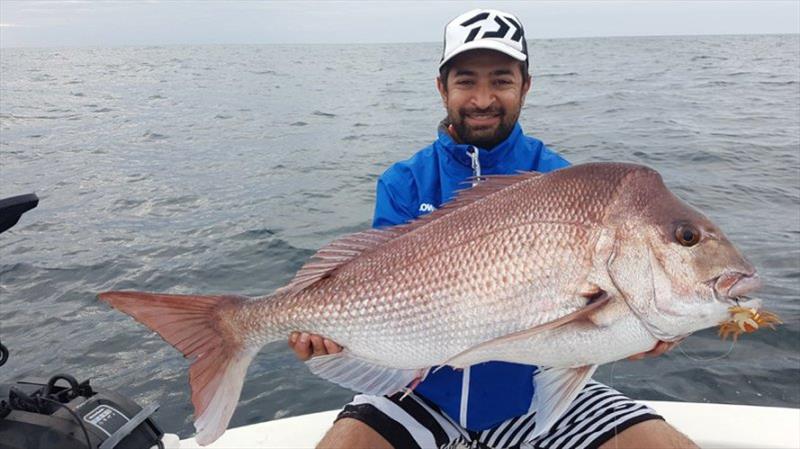Nabeel Issa holding a snapper photo copyright Lowrance taken at  and featuring the Fishing boat class